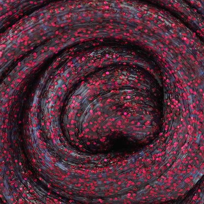 Close up detail of red glitter putty.